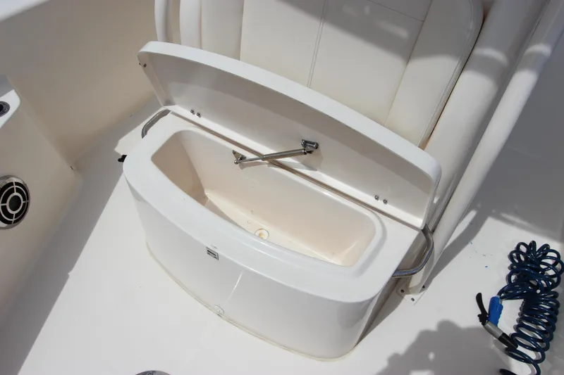 Slide: The Image of Open storage compartment on 2015 Grady-White 251 Coastal Explorer boat. - 32