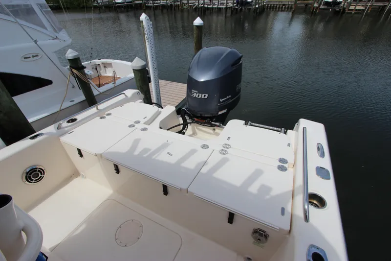 Slide: The Image of 2015 Grady-White 251 Coastal Explorer boat with Yamaha 300 engine at dock. - 7