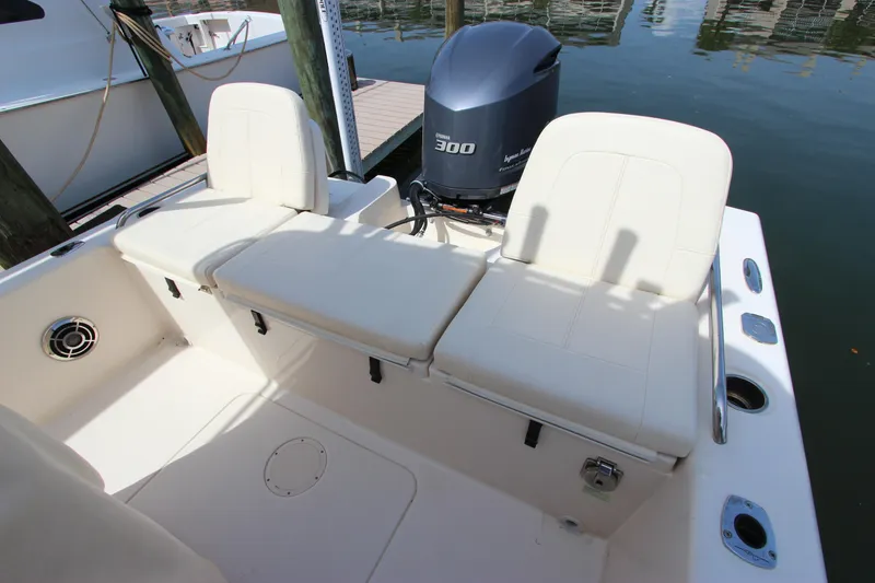 Slide: The Image of 2015 Grady-White 251 Coastal Explorer boat seating and engine view. - 9
