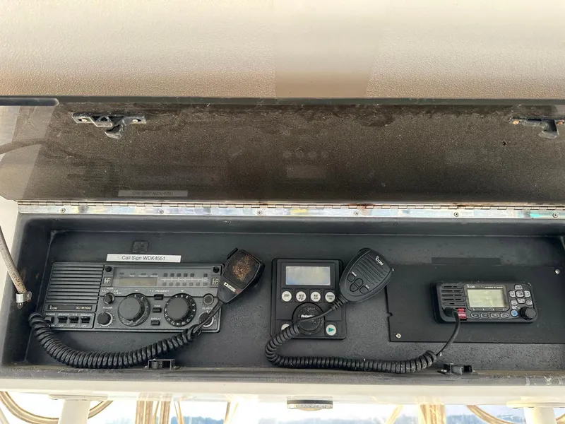 Slide: The Image of 1996 Viking 43 Convertible Sportfish radio and communication equipment panel. - 15
