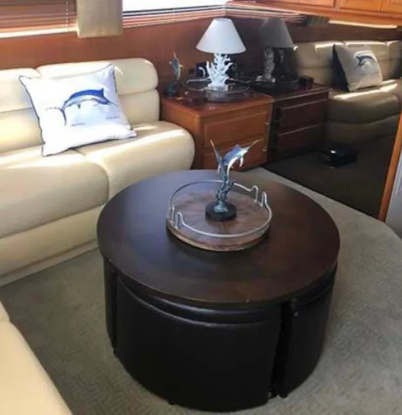 Slide: The Image of Interior of 1996 Viking 43 Convertible Sportfish with elegant seating and marine decor. - 18