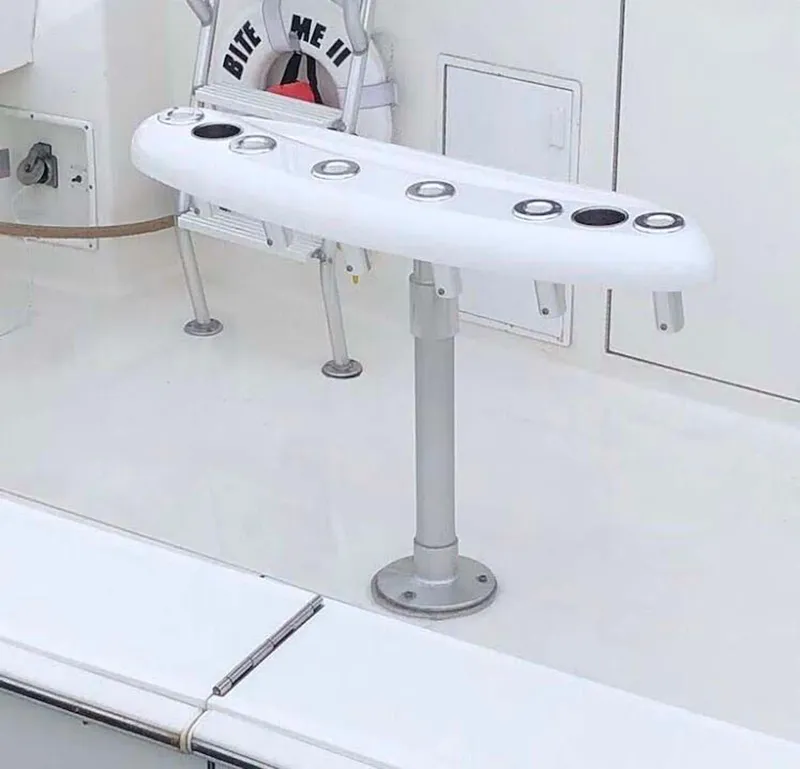 Slide: The Image of Fishing rod holder on 1996 Viking 43 Convertible Sportfish boat deck. - 28