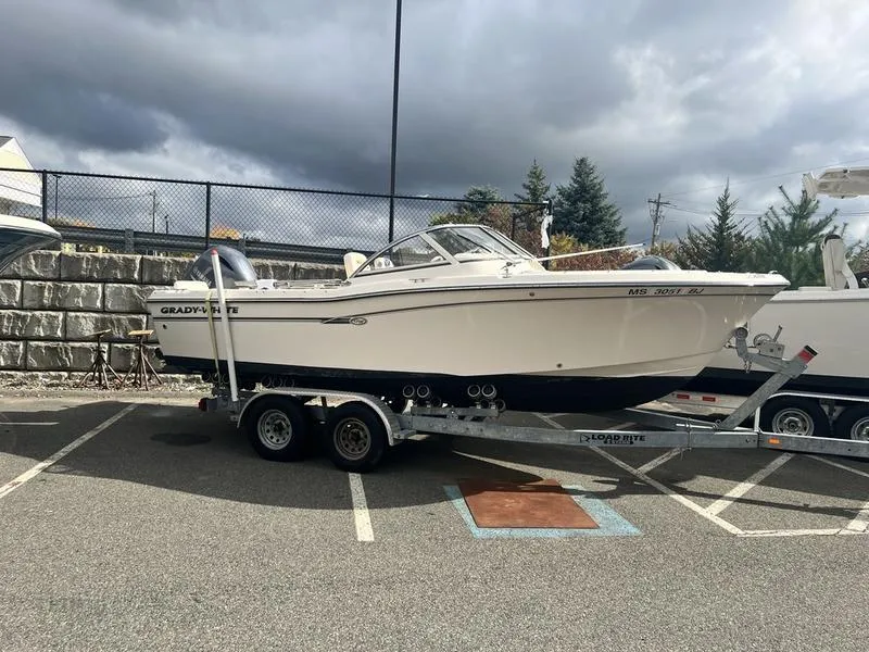 Slide: The Image of 2017 Grady-White 205 Freedom boat on trailer in parking lot. - 6