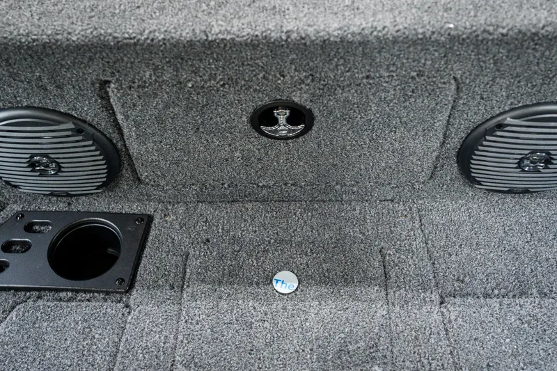 Slide: The Image of 2025 Lund 1875 Impact boat interior with speakers and cup holder. - 20