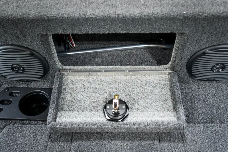 Slide: The Image of 2025 Lund 1875 Impact boat interior with speakers and storage compartment. - 21