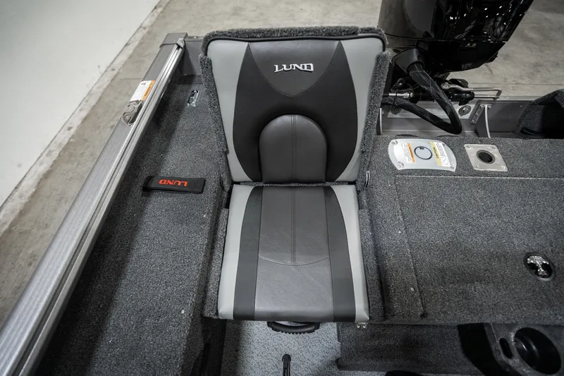 Slide: The Image of 2025 Lund 1875 Impact boat seat, gray and black design, interior view. - 33