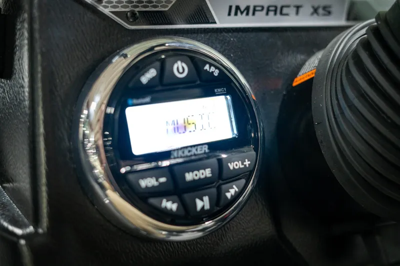 Slide: The Image of Close-up of 2025 Lund 1875 Impact XS audio control panel. - 38