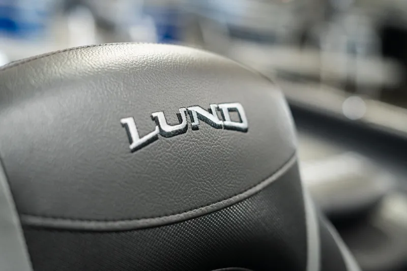 Slide: The Image of Close-up of 2025 Lund 1875 Impact boat seat with logo. - 45