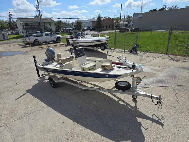 Slide: The Image of 2020 Xpress XP18CC boat on trailer in outdoor lot. - 5