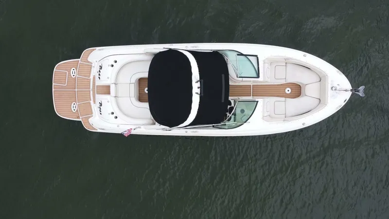 Slide: The Image of Aerial view of 2008 Sea Ray 290 SLX boat on water. - 11