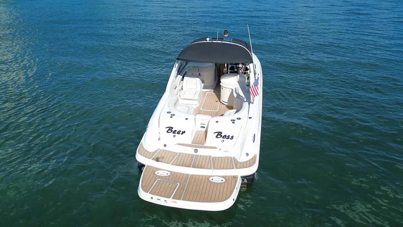 Slide: The Image of 2008 Sea Ray 290 SLX boat on water, rear view with "Beer Boss" text. - 15