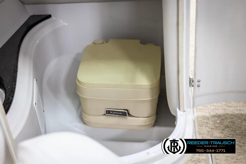 Slide: The Image of Portable toilet inside 2008 Crownline 240 EX boat cabin. - 24