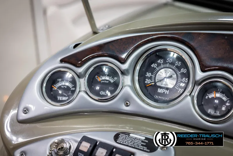 Slide: The Image of Dashboard of a 2008 Crownline 240 EX boat with speedometer and gauges. - 30