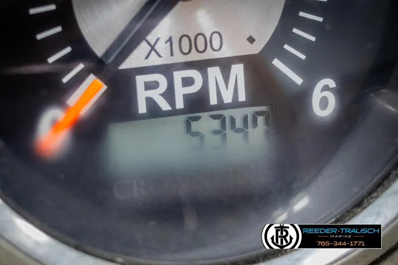 Slide: The Image of Close-up of 2008 Crownline 240 EX RPM gauge displaying 534 hours. - 33
