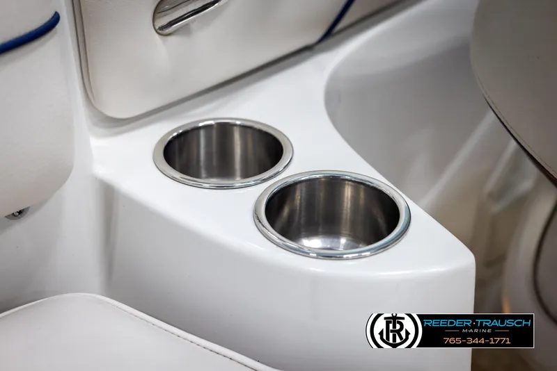 Slide: The Image of Cup holders in a 2008 Crownline 240 EX boat interior. - 38