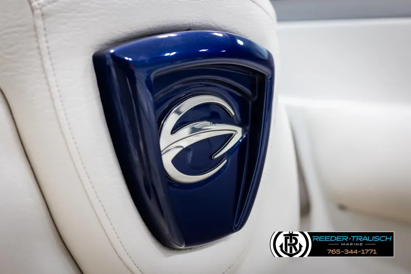 Slide: The Image of Crownline 240 EX 2008 logo on white upholstery, Reeder-Trausch Marine branding visible. - 41