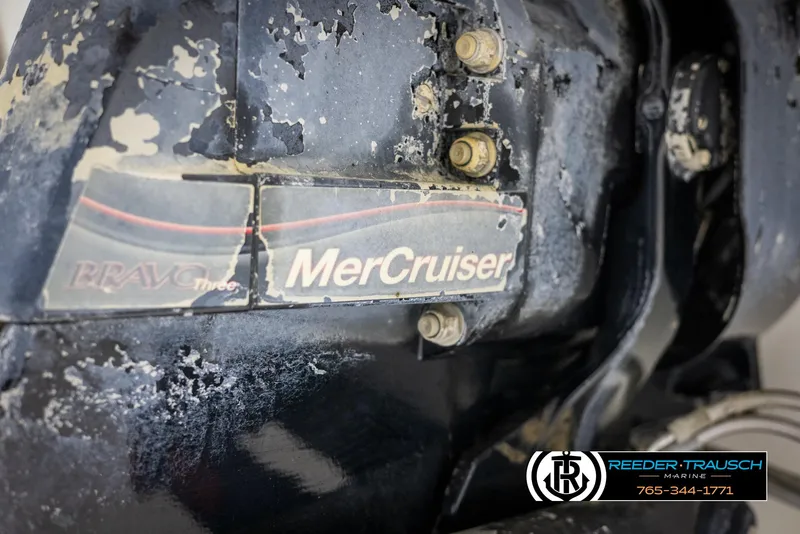 Slide: The Image of Close-up of a weathered MerCruiser Bravo Three outdrive on a 2008 Crownline 240 EX boat. - 49