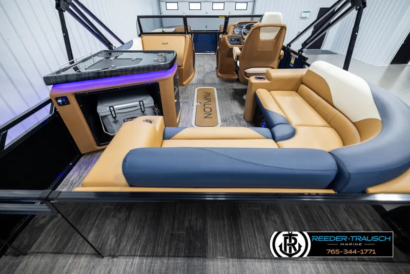Slide: The Image of 2025 Avalon LSZ ELW boat interior with luxurious seating and modern amenities. - 16