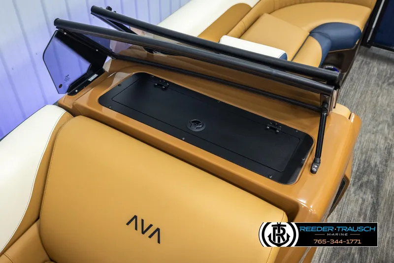 Slide: The Image of Avalon LSZ ELW 2025 boat interior with tan seating and storage compartment. - 23