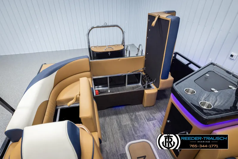 Slide: The Image of 2025 Avalon LSZ ELW boat interior with luxurious seating and modern amenities. - 29