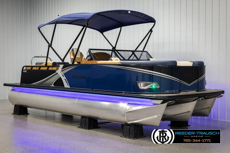 Slide: The Image of 2025 Avalon LSZ ELW pontoon boat with blue canopy and LED lights. - 3