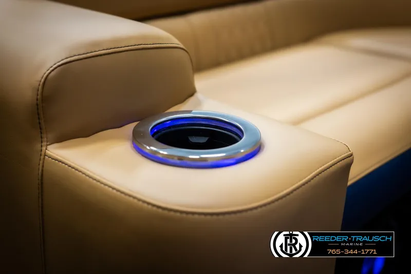 Slide: The Image of Luxurious Avalon LSZ ELW 2025 boat seating with illuminated cup holder. - 40