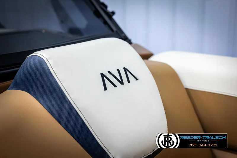 Slide: The Image of 2025 Avalon LSZ ELW boat seat with logo, featuring tan and white upholstery. - 45