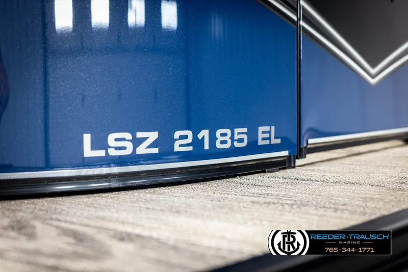 Slide: The Image of 2025 Avalon LSZ ELW boat with blue exterior and model number LSZ 2185 EL. - 48