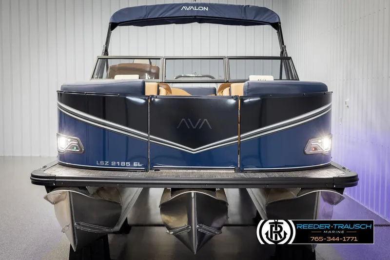 Slide: The Image of 2025 Avalon LSZ ELW pontoon boat, front view, in showroom setting. - 8