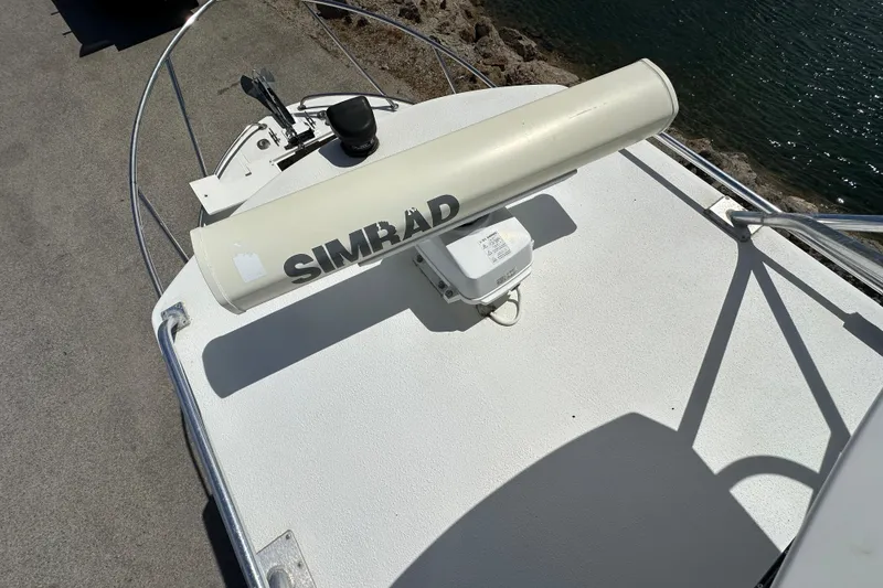 Slide: The Image of Radar equipment on 2012 Davis Rock Harbor 25 boat deck, near water. - 33