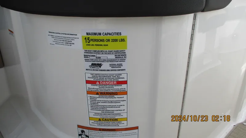 Slide: The Image of Capacity warning label on 2020 Sea Ray SLX 250 boat, maximum 15 persons or 2200 lbs. - 19