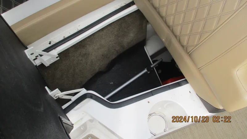 Slide: The Image of Storage compartment in 2020 Sea Ray SLX 250 boat interior. - 23