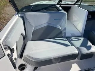 Slide: The Image of 2024 MasterCraft ProStar boat interior with gray and white seating. - 3