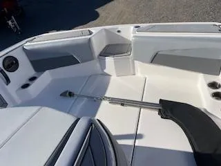 Slide: The Image of 2024 MasterCraft ProStar boat interior with seating and storage compartments. - 4