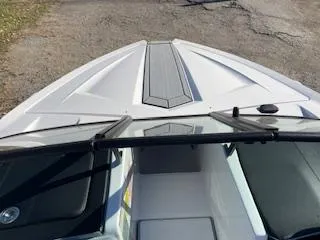 Slide: The Image of 2024 MasterCraft ProStar boat, top view of sleek white deck design. - 5