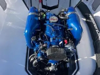 Slide: The Image of 2024 MasterCraft ProStar engine with blue components, showcasing advanced marine engineering. - 7