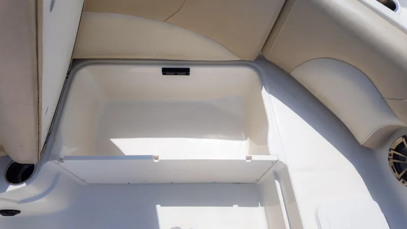 Slide: The Image of 2017 NauticStar 203 SC boat interior storage compartment. - 28