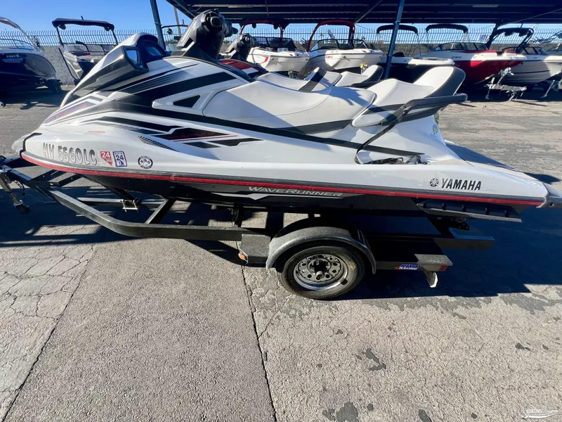 Slide: The Image of 2018 Yamaha WaveRunner VX Cruiser/Limited on trailer in a parking lot. - 1