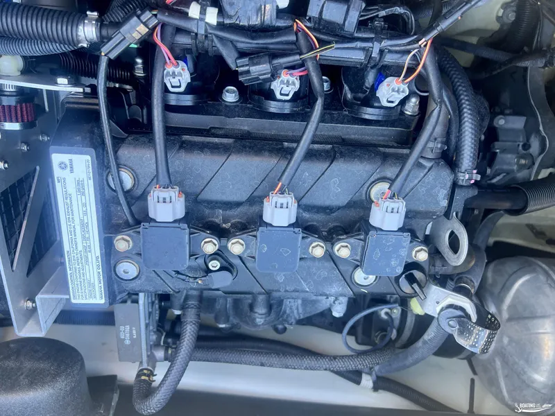 Slide: The Image of 2018 Yamaha WaveRunner VX Cruiser engine components and wiring close-up. - 11