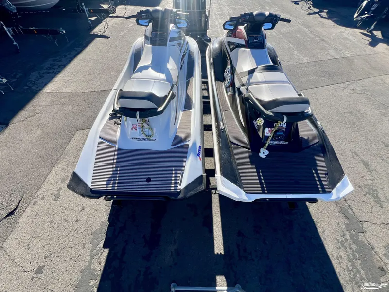 Slide: The Image of 2018 Yamaha WaveRunner VX Cruiser/Limited jet skis on trailer, parked outdoors. - 4