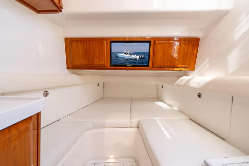 Slide: The Image of Luxurious interior cabin of 2020 HCB 53 Sueños boat with wooden accents. - 18