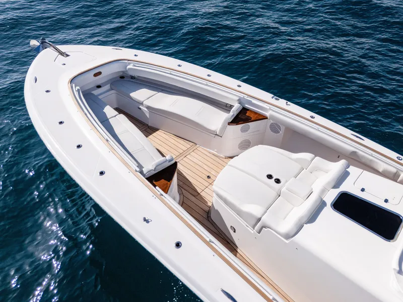 Slide: The Image of 2020 HCB 53 Sueños boat with spacious seating on open water. - 4