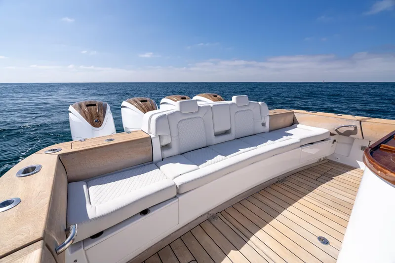 Slide: The Image of Luxury HCB 53 Sueños 2020 boat with spacious seating and ocean view. - 9