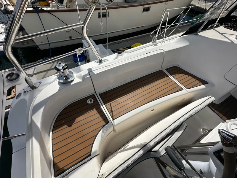 Slide: The Image of Hunter 38 sailboat cockpit with teak flooring, 2008 model, docked at marina. - 28