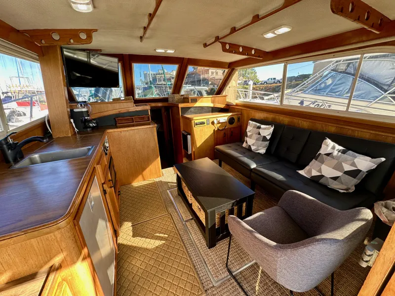 Slide: The Image of Interior of 1985 Egg Harbor 33 Sedan yacht with cozy seating and modern amenities. - 21