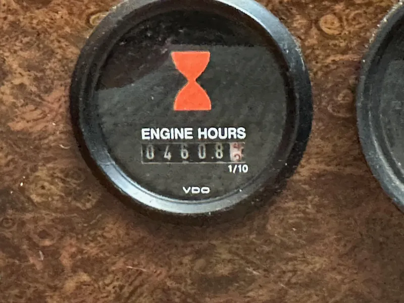 Slide: The Image of Engine hour meter showing 460.8 hours on 1985 Egg Harbor 33 Sedan. - 29