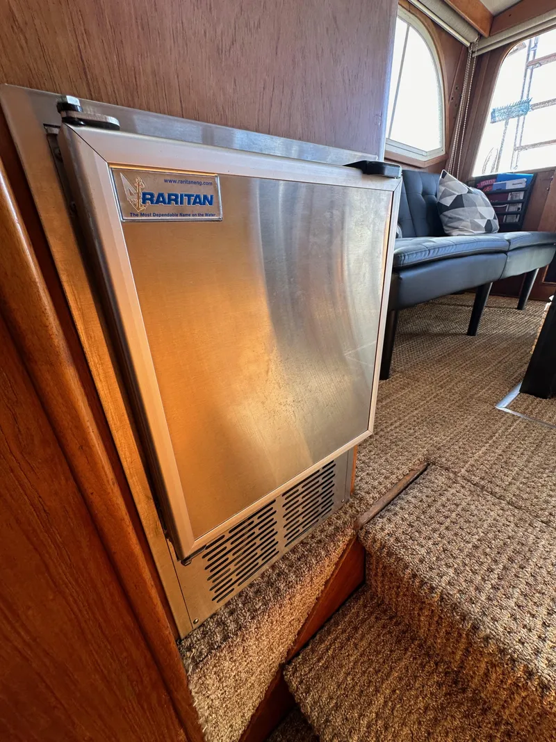Slide: The Image of Raritan fridge on 1985 Egg Harbor 33 Sedan yacht interior. - 43