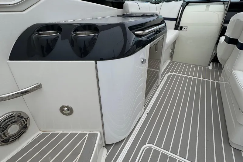 Slide: The Image of 2018 Formula 310SS boat interior with sleek cabinetry and modern design. - 19
