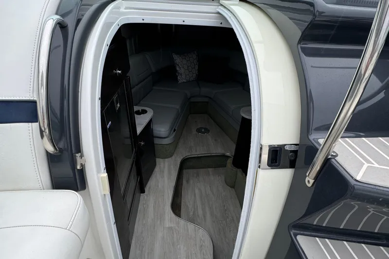 Slide: The Image of Interior view of 2018 Formula 310SS boat, featuring sleek seating and modern design. - 24