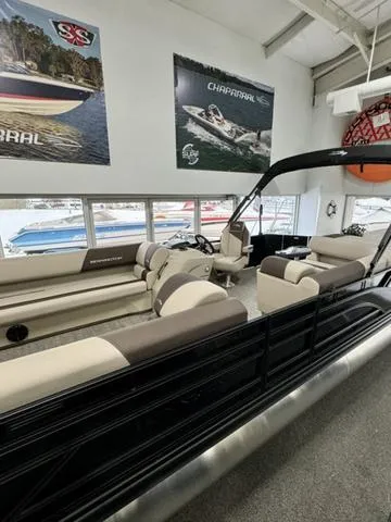 Slide: The Image of 2025 Bennington 23 SL boat dashboard with steering wheel and gauges. - 14